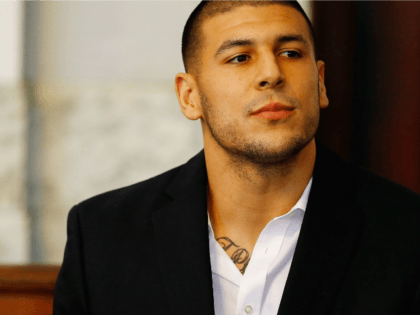 Aaron Hernandez sitting in the courtroom of the Attleboro District Court during his hearin