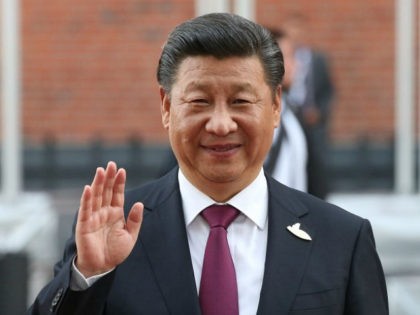 HAMBURG, GERMANY - JULY 07: (RUSSIA OUT) Chinese President Xi Jinping waves arriving to the Elbphilharmone for the dinner during the G20 Summit on July,7,2017 in Hamburg, Germany. (Photo by Mikhail Svetlov/Getty Images)