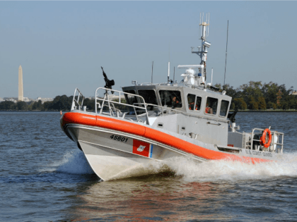Coast Guard Boat on the Potomac River with the Washington Monument in the Background