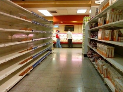 An empty supermarket is pictured in Caracas on May 28, 2016. The shortage of basic foodstu