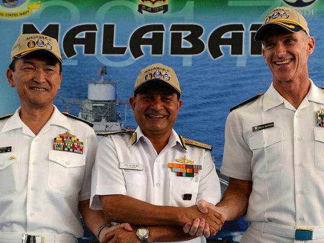 Japanese Rear Admiral Hiroshi Yamamura (L), US Rear Admiral William Byrne (R) and HCS Bish