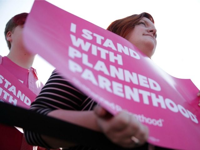 Activists participate in a rally to support Planned Parenthood March 1, 2017 on Capitol Hill in Washington, DC. Planned Parenthood held a ÒWe Are Planned Parenthood Capitol Takeover DayÓ to lobby legislators not to defund the organization. (Photo by Alex Wong/Getty Images)