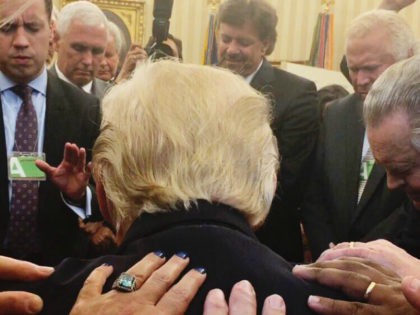 Televangelist Rodney Howard-Browne, a South African native who came to the United States in 1987, shared a post on Facebook about the prayer circle he led alongside his wife, Adonica Howard-Browne. The photo shows both Trump and Vice President Mike Pence in prayer: