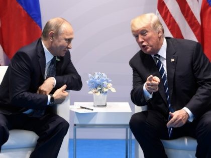 US President Donald Trump and Russia's President Vladimir Putin hold a meeting on the sidelines of the G20 Summit in Hamburg, Germany, on July 7, 2017. / AFP PHOTO / SAUL LOEB (Photo credit should read SAUL LOEB/AFP/Getty Images)