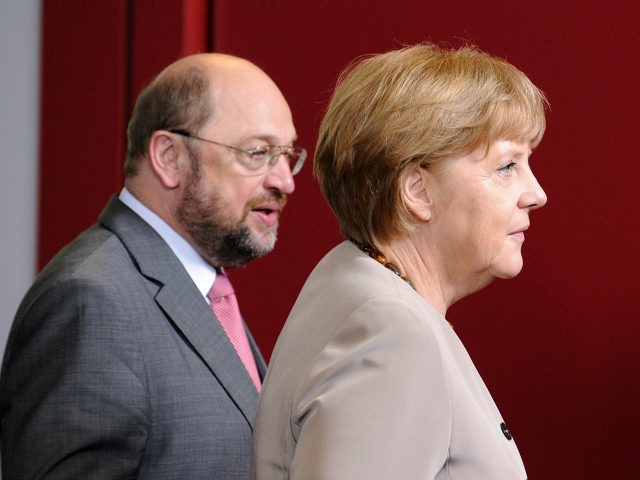 German Chancellor Angela Merkel (R) and European Parliament President Martin Schulz arive