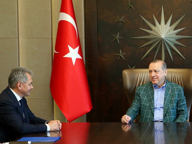 Turkey's President Recep Tayyip Erdogan, right, meets with Russia's Defence Minister Serge