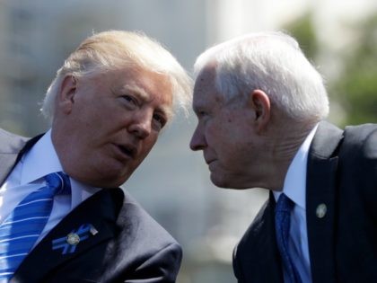 President Donald Trump talks with Attorney General Jeff Sessions, gestures before speaking at the 36th Annual National Peace Officers' memorial service, Monday, May 15. 2017, on Capitol Hill in Washington. (AP Photo/Evan Vucci)