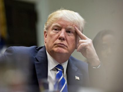 President Donald Trump listens while meeting with women small business owners in the Roosevelt Room of the White House on March 27, 2017 in Washington, D.C. Investors on Monday further unwound trades initiated in November resting on the idea that the election of Trump and a Republican Congress meant smooth …