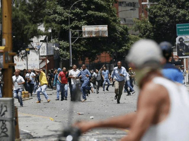 Venezuela strike erupts into sporadic violence Photo