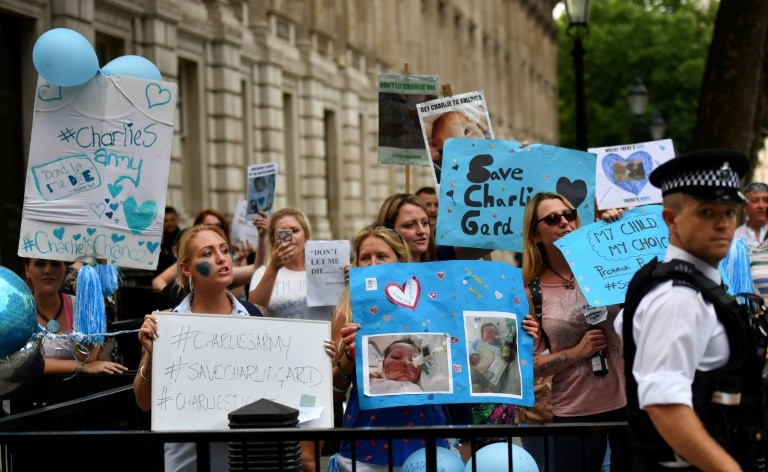 People gather in support of continued medical treatment for critically-ill 10-month old Charlie Gard in London on July 6, 2017
