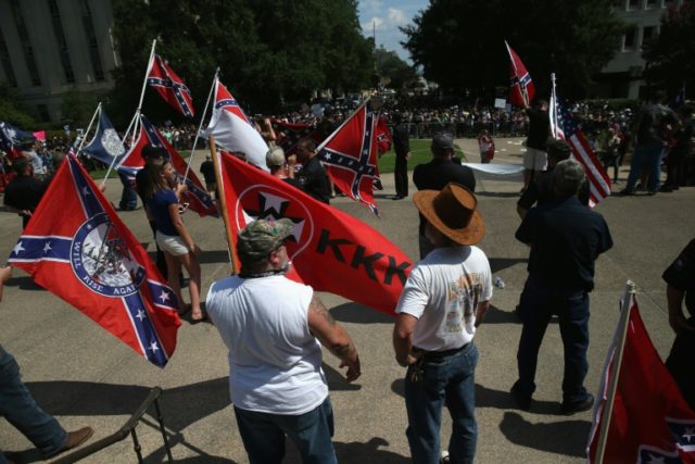 This photo taken in July 2015 shows Ku Klux Klan members staging a demonstration at the st