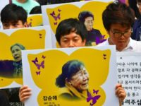 South Korean protesters hold placards showing portraits of former "comfort women". The plight of the so-called "comfort women" who were forced into sexual slavery for Japanese troops during World War II is an emotional issue that has marred ties South Korean protesters hold placards showing portraits of former "comfort women". The plight of the so-called "comfort women" who were forced into sexual slavery for Japanese troops during World War II is an emotional issue that has marred ties