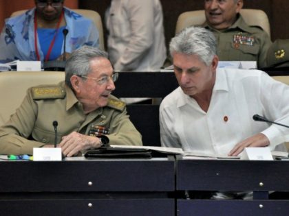 Cuban President Raul Castro (L) and First Vice president Miguel Diaz-Canel speak during the Permanent Working Committees of the National Assembly of the People's Power in Havana, on July 14, 2017
