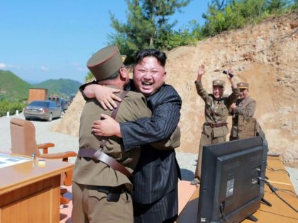 North Korean leader Kim Jong-un seen celebrating the successful test of an intercontinental ballistice missile July 5, which has prompted calls at the UN for tougher sanctions on Pyongyang
