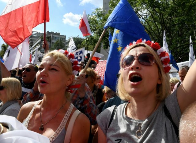 Demonstrators protest against judicial reforms in Warsaw on July 16, 2017