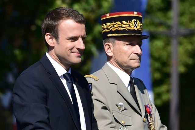 French President Emmanuel Macron (left) and outgoing armed forces chief General Pierre de