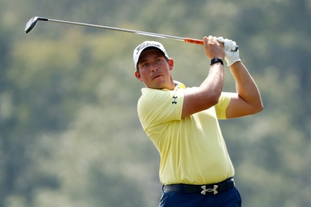 Scott Stallings of the United States plays his shot from the ninth tee at the Barbasol Cha