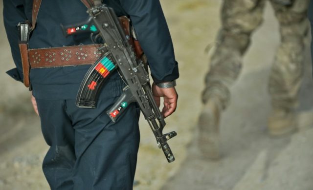 Afghan security forces, beset by killings, desertions and non-existent "ghost soldiers" on