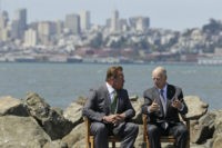 Jerry Brown, Arnold Schwarzenegger The Associated Press