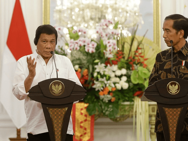 President Rodrigo Duterte, left, talks to the media as his Indonesian counterpart Joko Wid