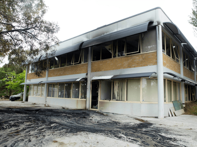 A general view shows damage to the Australian Christian Lobby after a burning van hit the