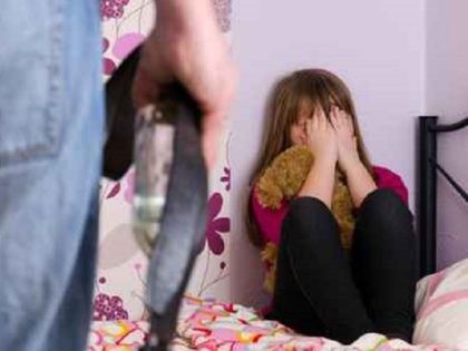 Scared daughter because of father anger after alcohol drinking