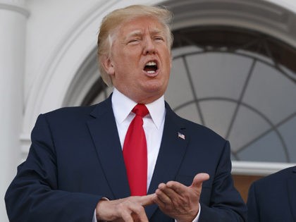 President Donald Trump, accompanied by Vice President Mike Pence, speaks to reporters befo