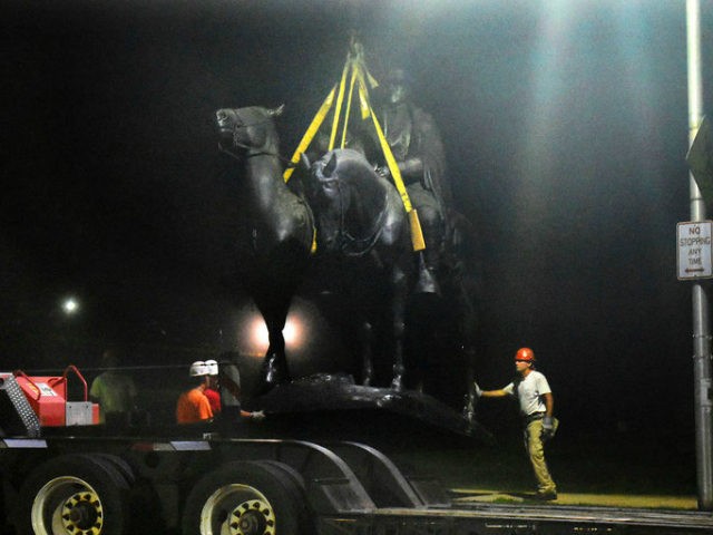 Workers removed the Robert E. Lee and Thomas J. “Stonewall” Jackson monument in Baltimore during the night. Credit Jerry Jackson/The Baltimore Sun, via Associated Press