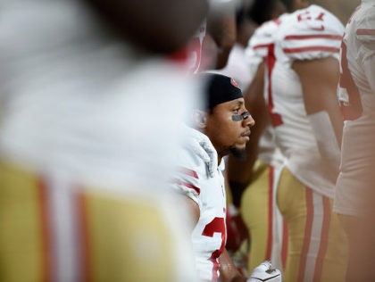 MINNEAPOLIS, MN - AUGUST 27: Eric Reid #35 of the San Francisco 49ers kneels dugout the Na