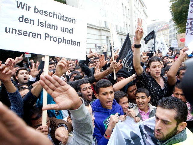 Muslims protest infront of the US embassy on September 22, 2012 in Vienna. Protests against the film, which mocks Islam and was made by extremist Christians, have erupted across the world, leading to more than 50 deaths since the first demonstrations on September 11. AFP PHOTO / DIETER NAGL (Photo …