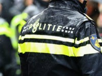 BREDA, NETHERLANDS - MARCH 08: A general view of the police as they protect PVV Candidate, Geert Wilders (not in frame) as he speaks to the crowd, hands out pamphlets or flyers and poses for selfies on his election campaign near Van Coothplein on March 8, 2017 in Breda, Netherlands. …