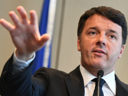 Former Italian Matteo Renzi addresses the press while campaigning for the Italian Democrat