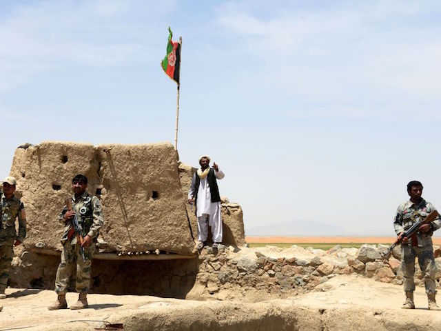 Afghan Border Police personnel keep watch during an ongoing battle between Pakistani and Afghan Border forces near the Durand line at Spin Boldak, in southern Kandahar province on May 5, 2017. Pakistani and Afghan officials have accused each other of killing civilians after gunfire erupted near a major border crossing …