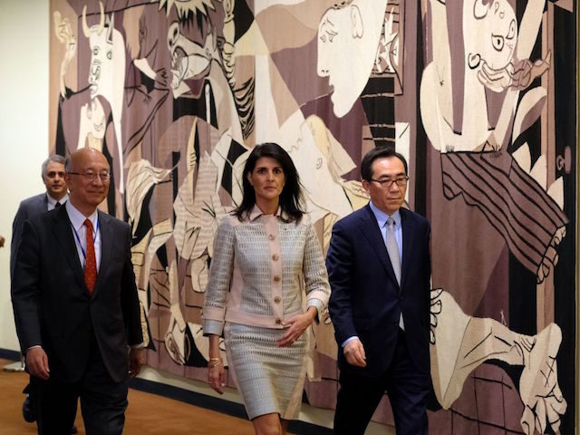 US Ambassador to the United Nations Nikki Haley (C), Japanese Ambassador Koro Bessho (L) a
