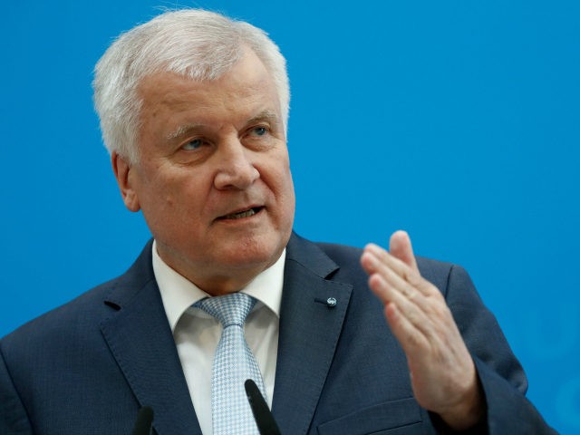 Horst Seehofer, leader of the conservative Christian Democratic Union's (CDU) Bavarian sister Party CSU, gestures during a press conference to present the electoral programme of the conservative CDU/CSU union for the September 24 parliamentary election on July 3, 2017 in Berlin. / AFP PHOTO / Odd ANDERSEN (Photo credit should …