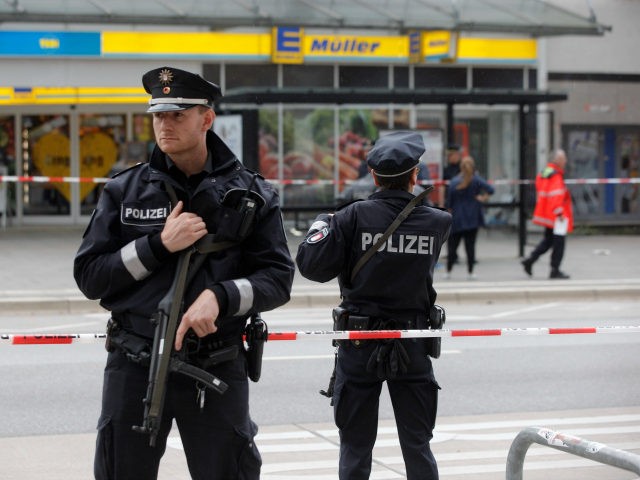 Police cordon off the area around a supermarket in the northern German city of Hamburg, where a man killed one person and wounded several others in a knife attack, on July 28, 2017. 'There is no valid information yet on the motive or the number of people injured' by the …