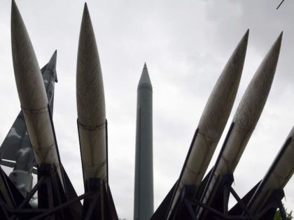 Replicas of a North Korean Scud-B missile (C) and South Korean Hawk surface-to-air missiles are displayed at the Korean War Memorial in Seoul on August 10, 2017. Nuclear-armed North Korea mocked President Donald Trump as "bereft of reason" on August 10, raising the stakes in their stand-off with an unusually …