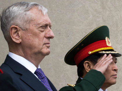 US Secretary of Defense James Mattis (L), and General Ngo Xuan Lich, Minister of National Defense of the Socialist Republic of Vietnam, listen to their respective National Anthems during arrival ceremonies at the Pentagon August 8, 2017, 2017, in Washington, DC. PAUL J. RICHARDS / AFP