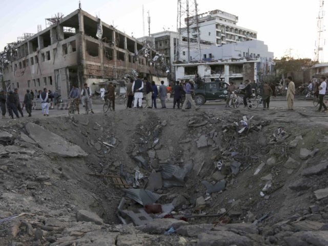 Kabul Afghanistan crater (Rahman Gul / Associated Press)