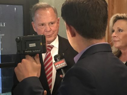 Roy Moore speaks to reports at the Jefferson County Republican Executive Committee Meeting