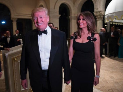 US President-elect Donald Trump arrives with his wife Melania for a New Year's Eve party December 31, 2016 at Mar-a-Lago in Palm Beach, Florida. (DON EMMERT/AFP/Getty Images)