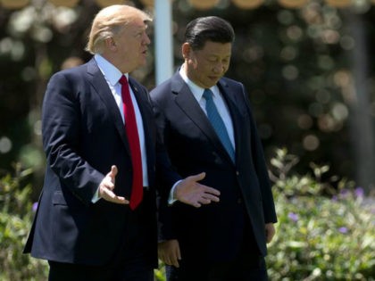 US President Donald Trump (L) and Chinese President Xi Jinping (R) walk together at the Mar-a-Lago estate in West Palm Beach, Florida, April 7, 2017.17. President Donald Trump entered a second day of talks with his Chinese counterpart Xi Jinping on Friday hoping to strike deals on trade and jobs …