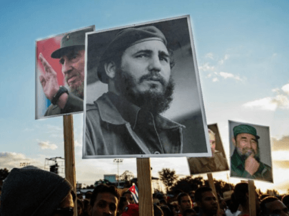 Cubans pay their respects to late revolutionary leader Fidel Castro during a ceremony in Santiago, on December 3, 2016
