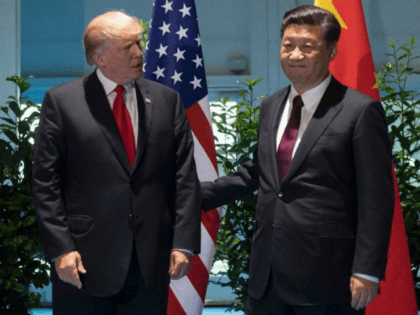 U.S. President Donald Trump, left, and China's President Xi Jinping arrive for a meeting o