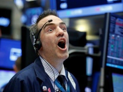 Man reacts to Dow Jones hitting 22,000 for first time in history Wednesday, August 2, 2017.