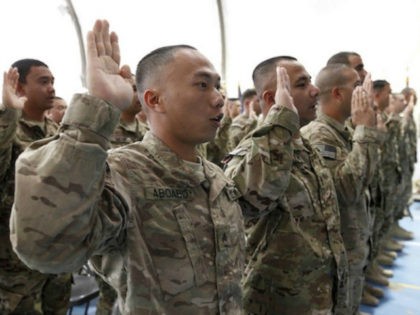 U.S. troops are sworn in as naturalized citizens on Nov. 2, 2012, at Bagram Airfield in Afghanistan. (State Department)