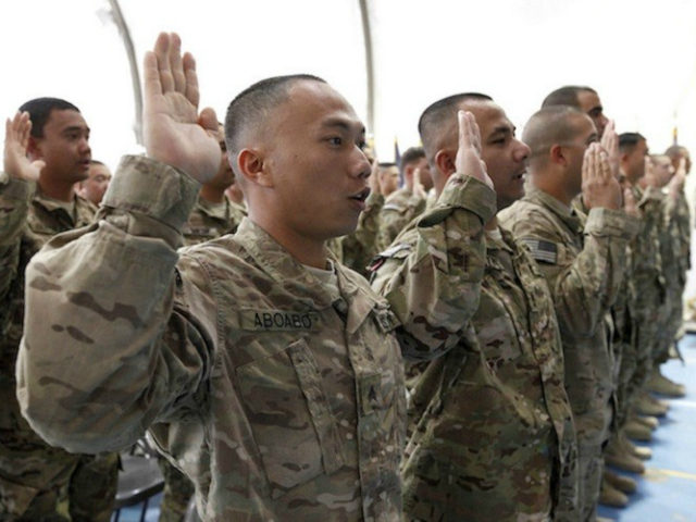 U.S. troops are sworn in as naturalized citizens on Nov. 2, 2012, at Bagram Airfield in Af