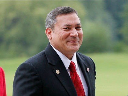 FILE - In this July 27, 2012, file photo, Guam Gov. Eddie Calvo arrives at Buckingham Palace in London for a reception hosted by Queen Elizabeth II prior to the opening ceremony of the London 2012 Olympic Games. The U.S. territory of Guam, where almost everyone is Catholic, has been …