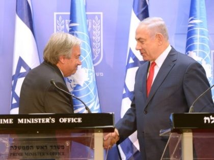 In this handout photo provided by the Israel Government Press Office (GPO), Israel's Prime Minister Benjamin Netanyahu (R) shakes hands with United Nations Secretary General Antonio Guterres on August 28, 2017 in Jerusalem, Israel. The UN Secretary General is on a four-day visit to Israel, his first visit since taking …