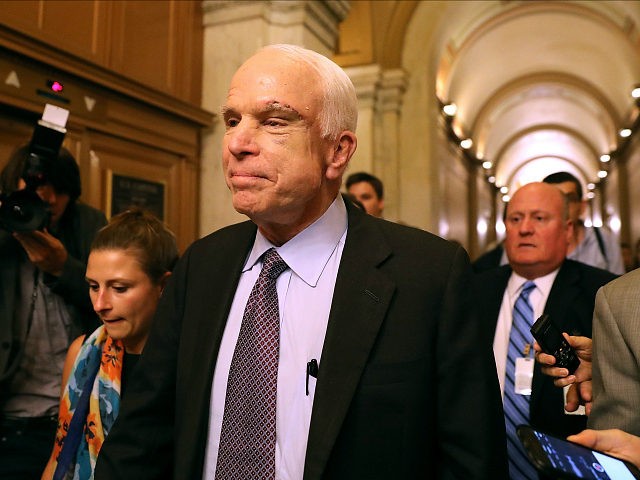 WASHINGTON, DC - JULY 28: Sen. John McCain (R-AZ) leaves the the Senate chamber at the U.S. Capitol after voting on the GOP 'Skinny Repeal' health care bill on July 28, 2017 in Washington, DC. Three Senate Republicans voted no to block a stripped-down, or 'Skinny Repeal,' version of Obamacare …
